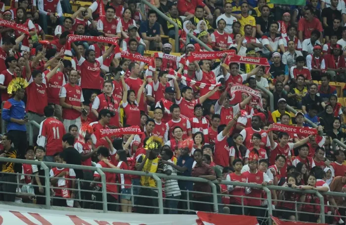 Framed Print : Arsenal's 4-0 Triumph over Malaysia XI: A Sea of Celebrating Fans at Bukit Jalil Stadium, 2011