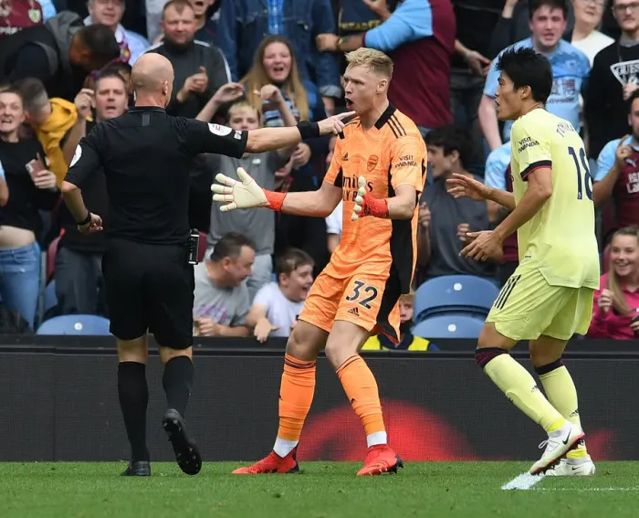 Framed Print : Arsenal's Aaron Ramsdale Pleads Innocence to Referee during Burnley vs Arsenal Clash (Premier League 2021-22) Framed Print : Arsenal's Aaron Ramsdale Pleads Innocence to Referee during Burnley vs Arsenal Clash (Premier League 2021-22)