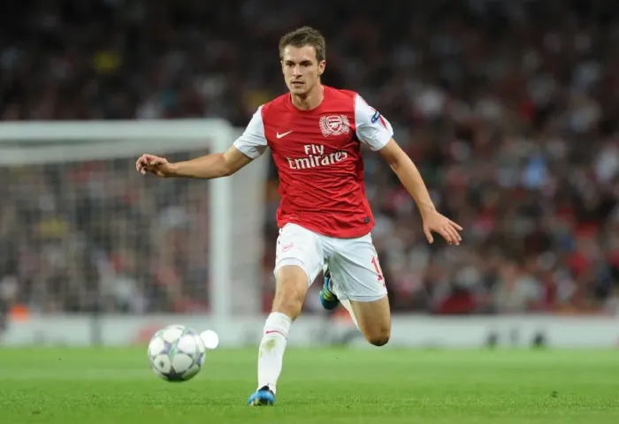 Framed Print : Arsenal's Aaron Ramsey in Action during the 2011-12 UEFA Champions League Play-Off against Udinese Framed Print : Arsenal's Aaron Ramsey in Action during the 2011-12 UEFA Champions League Play-Off against Udinese