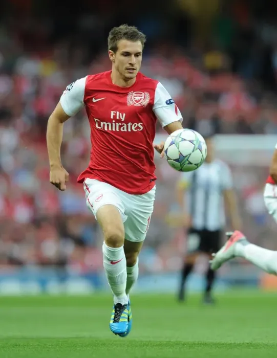 Framed Print : Arsenal's Aaron Ramsey in Action: Arsenal vs. Udinese, 2011-12 UEFA Champions League Play-Off Framed Print : Arsenal's Aaron Ramsey in Action: Arsenal vs. Udinese, 2011-12 UEFA Champions League Play-Off