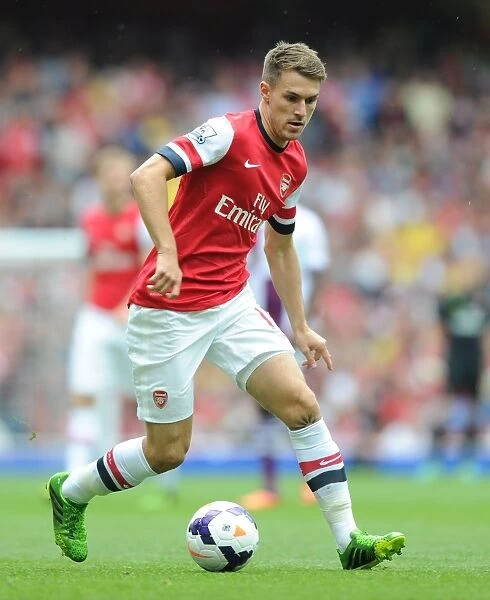 Arsenal's Aaron Ramsey in Action Against Aston Villa (2013-14 Premier League)