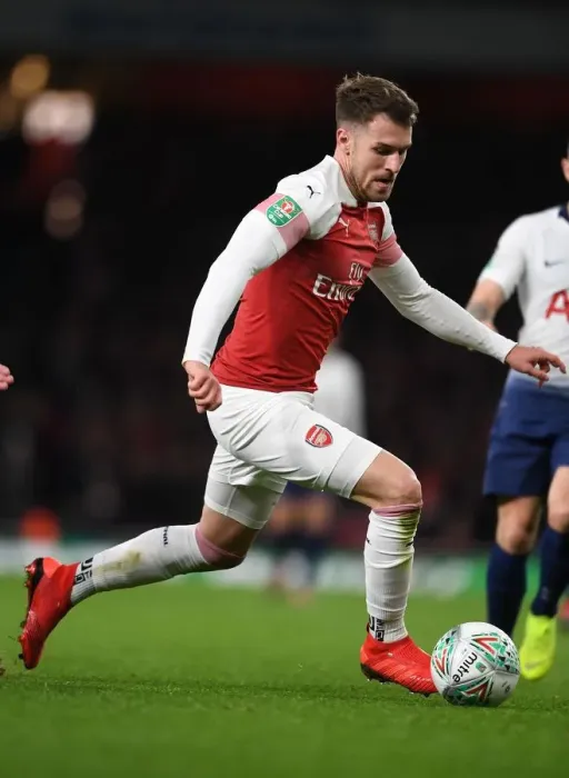 Framed Print : Arsenal's Aaron Ramsey in Action: Battle against Tottenham in Carabao Cup Framed Print : Arsenal's Aaron Ramsey in Action: Battle against Tottenham in Carabao Cup