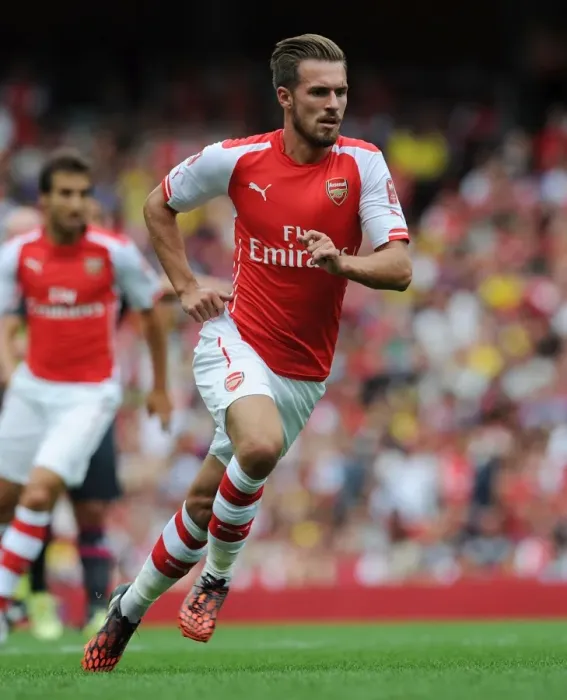 Framed Print : Arsenal's Aaron Ramsey in Action Against Benfica at Emirates Cup 2014