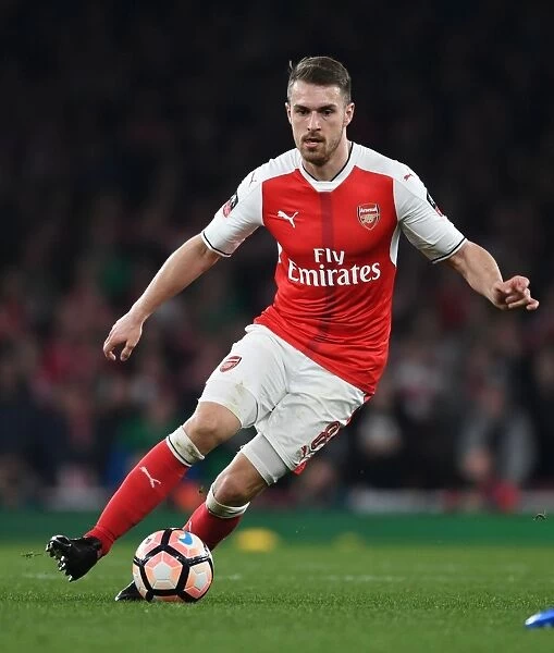 Arsenal's Aaron Ramsey in Action against Lincoln City in FA Cup Quarter-Final