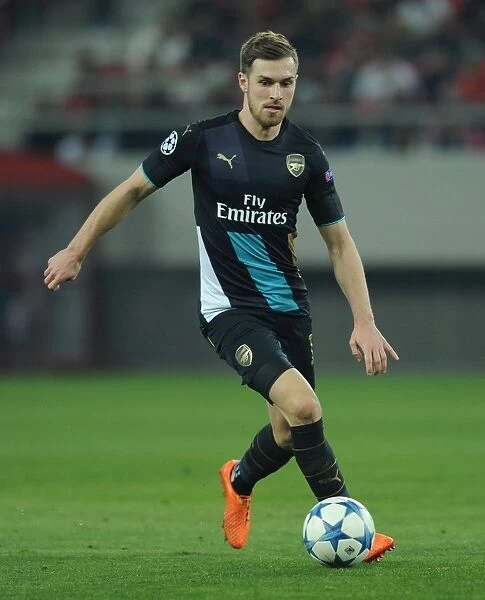 Arsenal's Aaron Ramsey in Action against Olympiacos, UEFA Champions League (December 2015)