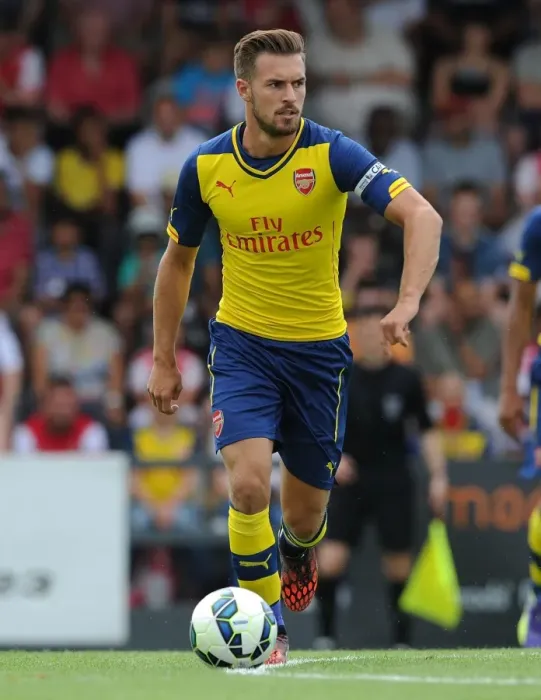 Framed Print : Arsenal's Aaron Ramsey in Action: A Thrilling Pre-Season Clash against Boreham Wood Framed Print : Arsenal's Aaron Ramsey in Action: A Thrilling Pre-Season Clash against Boreham Wood