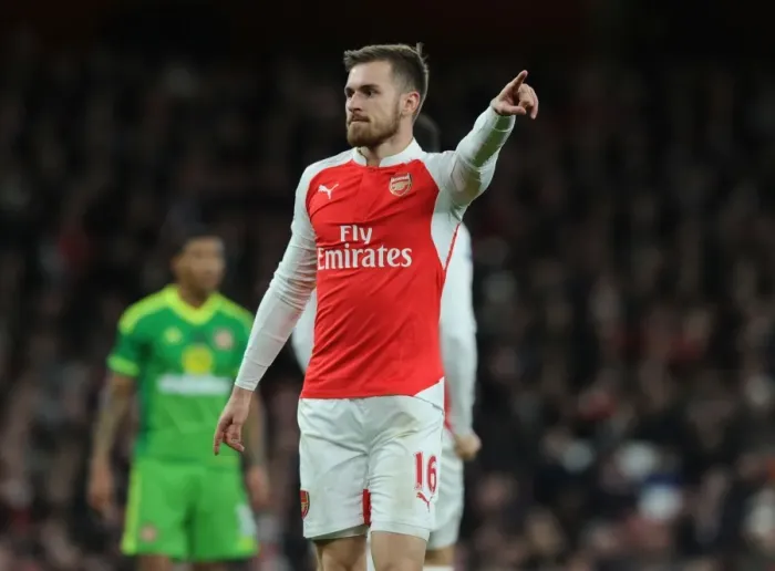 Framed Print : Arsenal's Aaron Ramsey Battles for Possession Against Sunderland in Premier League Showdown