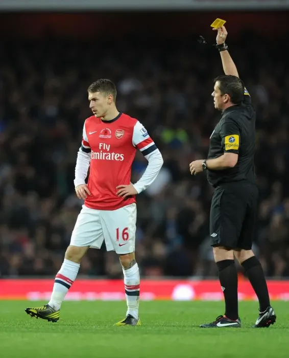 Framed Print : Arsenal's Aaron Ramsey Booked by Referee during Arsenal v Fulham Match, Premier League 2012-13