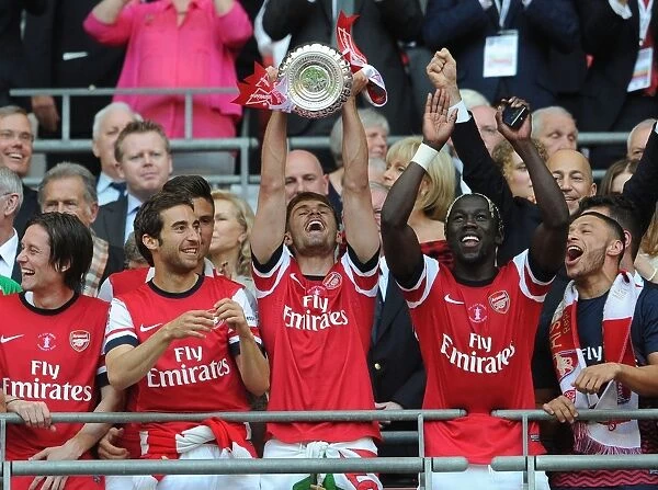 Arsenal's Aaron Ramsey Celebrates FA Cup Victory over Hull City (2014)