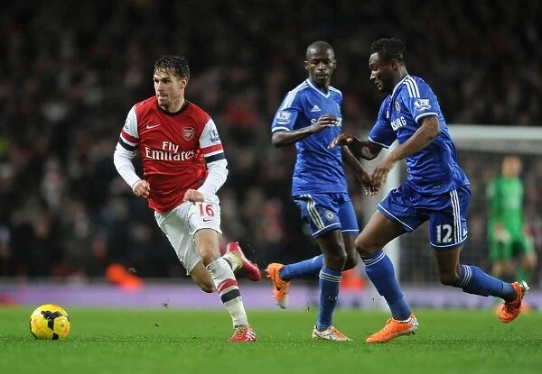 Arsenal's Aaron Ramsey Clashes with Chelsea's John Obi Mikel in Premier League Showdown