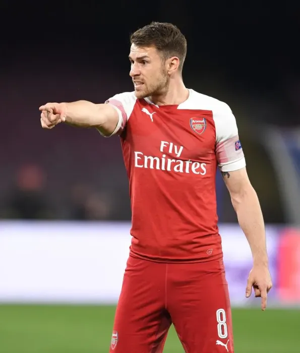 Framed Print : Arsenal's Aaron Ramsey Clashes with Napoli in Europa League Quarterfinals