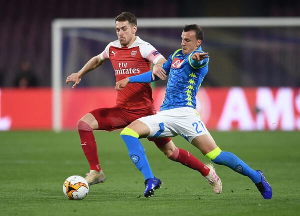 Arsenal's Aaron Ramsey Clashes with Napoli's Vlad Chiriches in Europa League Quarterfinal