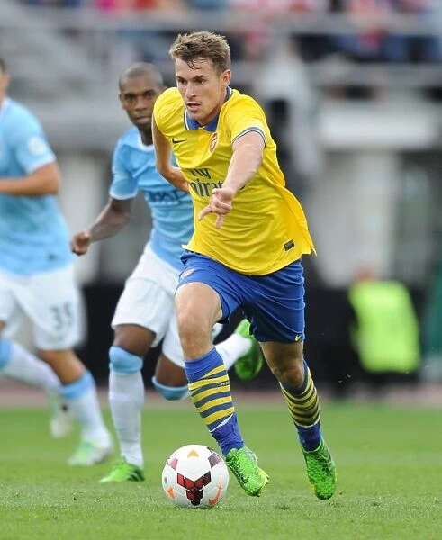 Arsenal's Aaron Ramsey Faces Manchester City in 2013: Pre-Season Clash in Helsinki