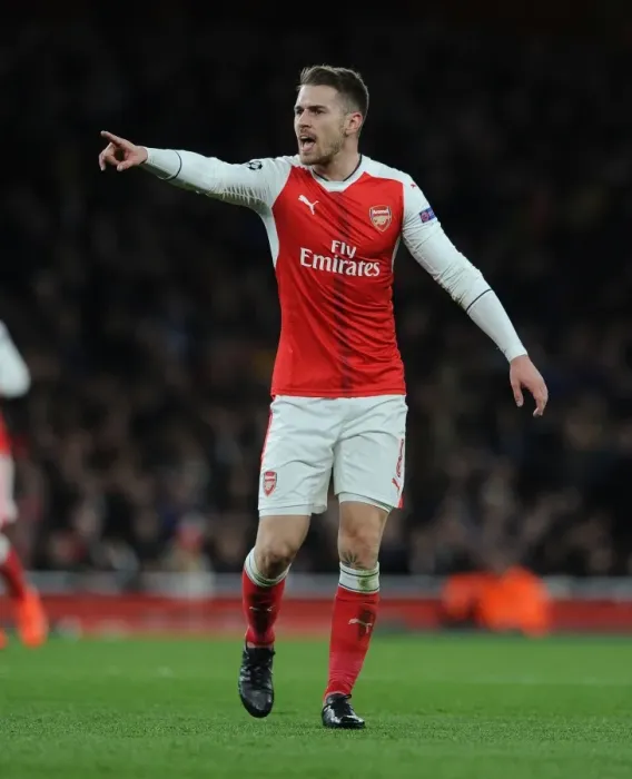 Framed Print : Arsenal's Aaron Ramsey Faces Off Against Bayern Munchen in Champions League Showdown