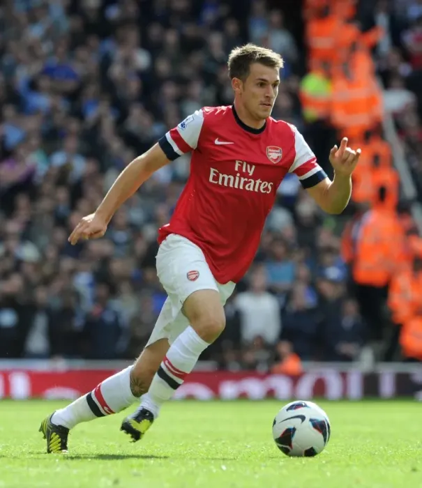 Framed Print : Arsenal's Aaron Ramsey Faces Off Against Chelsea in Premier League Showdown (2012-13)