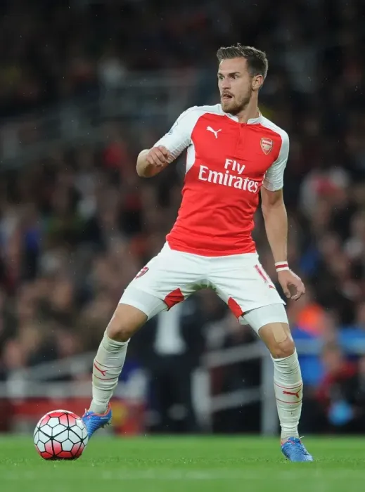 Framed Print : Arsenal's Aaron Ramsey Faces Off Against Liverpool in the 2015 / 16 Premier League Framed Print : Arsenal's Aaron Ramsey Faces Off Against Liverpool in the 2015 / 16 Premier League