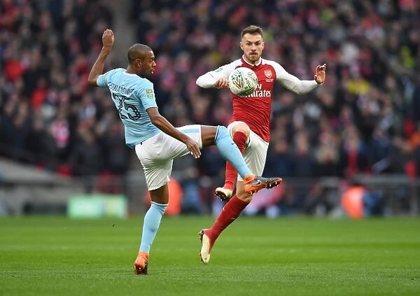 Arsenal's Aaron Ramsey Faces Off Against Manchester City's Fernandinho in Carabao Cup Final Showdown