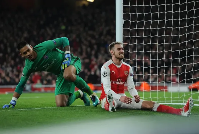 Framed Print : Arsenal's Aaron Ramsey Fumes as Paris Saint-Germain Holds the Upper Hand Framed Print : Arsenal's Aaron Ramsey Fumes as Paris Saint-Germain Holds the Upper Hand