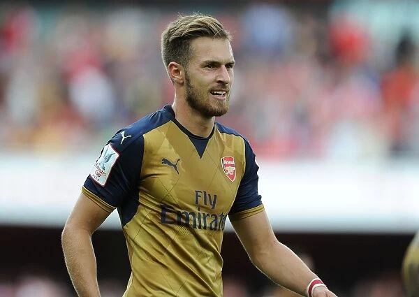 Arsenal's Aaron Ramsey Goes Head-to-Head with Olympique Lyonnais at the Emirates Cup