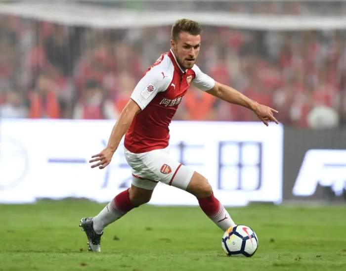 Framed Print : Arsenal's Aaron Ramsey Goes Head-to-Head Against Chelsea in Beijing Pre-Season Clash Framed Print : Arsenal's Aaron Ramsey Goes Head-to-Head Against Chelsea in Beijing Pre-Season Clash