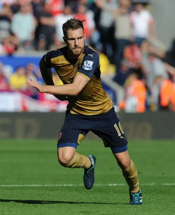 Framed Print : Arsenal's Aaron Ramsey Goes Head-to-Head with Leicester City in Premier League Showdown (2015 / 16)