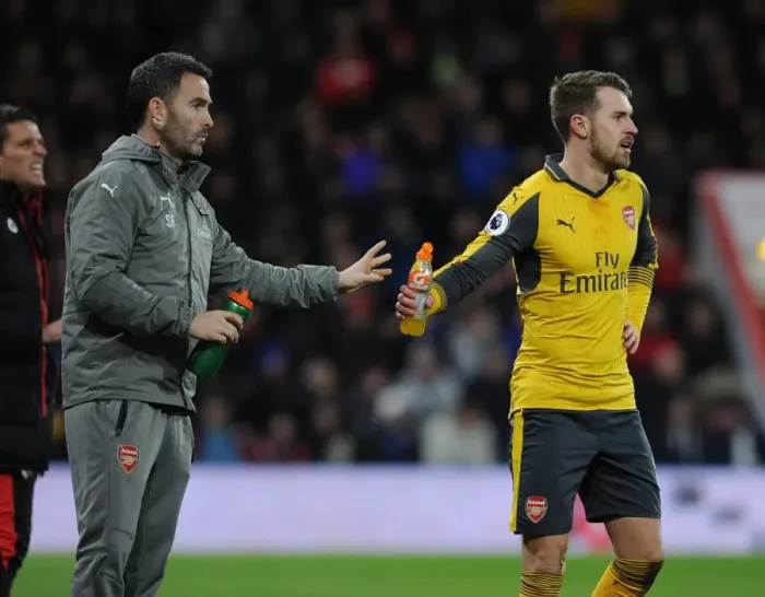 Framed Print : Arsenal's Aaron Ramsey Hydrates with Fitness Coach during AFC Bournemouth Match, 2016-17 Framed Print : Arsenal's Aaron Ramsey Hydrates with Fitness Coach during AFC Bournemouth Match, 2016-17