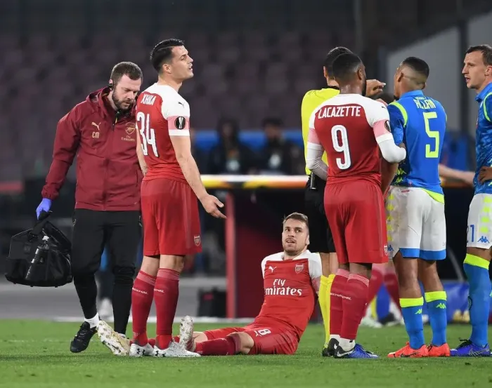 Framed Print : Arsenal's Aaron Ramsey Injured in Napoli's Europa League Quarterfinal Clash