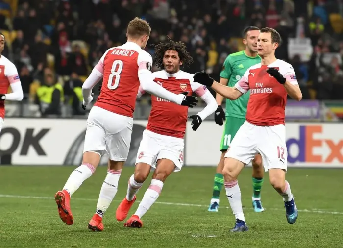 Framed Print : Arsenal's Aaron Ramsey, Mohamed Elneny, and Stephan Lichtsteiner Celebrate Goals Against Vorskla Poltava in Europa League Framed Print : Arsenal's Aaron Ramsey, Mohamed Elneny, and Stephan Lichtsteiner Celebrate Goals Against Vorskla Poltava in Europa League