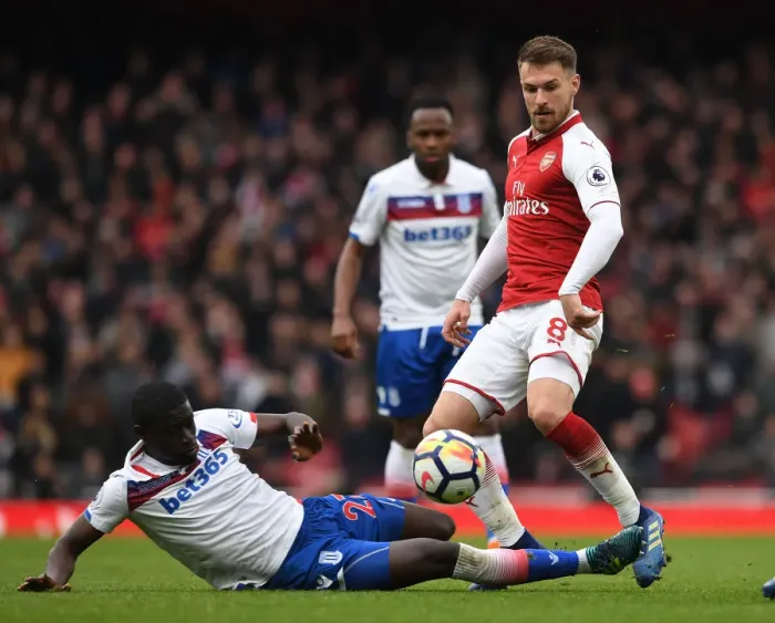 Framed Print : Arsenal's Aaron Ramsey Outsmarts Badou Ndiaye: Premier League Clash