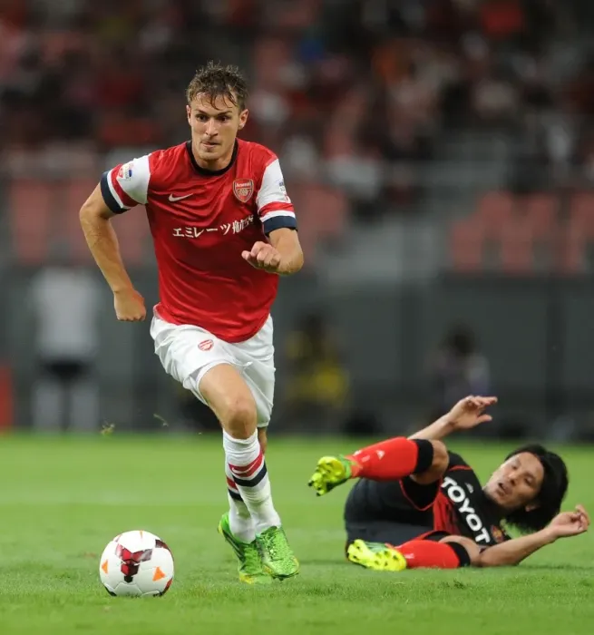 Framed Print : Arsenal's Aaron Ramsey Outsmarts Jungo Fujimoto: Pre-Season Victory over Nagoya Grampus (July 2013) Framed Print : Arsenal's Aaron Ramsey Outsmarts Jungo Fujimoto: Pre-Season Victory over Nagoya Grampus (July 2013)