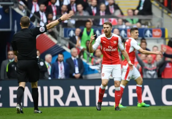 Framed Print : Arsenal's Aaron Ramsey Protests to Referee during FA Cup Semi-Final vs Manchester City Framed Print : Arsenal's Aaron Ramsey Protests to Referee during FA Cup Semi-Final vs Manchester City
