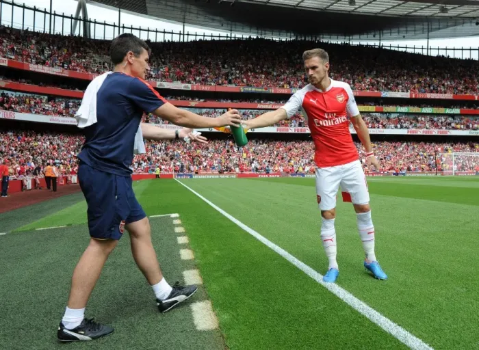 Framed Print : Arsenal's Aaron Ramsey Rehydrates During Arsenal vs West Ham United Match