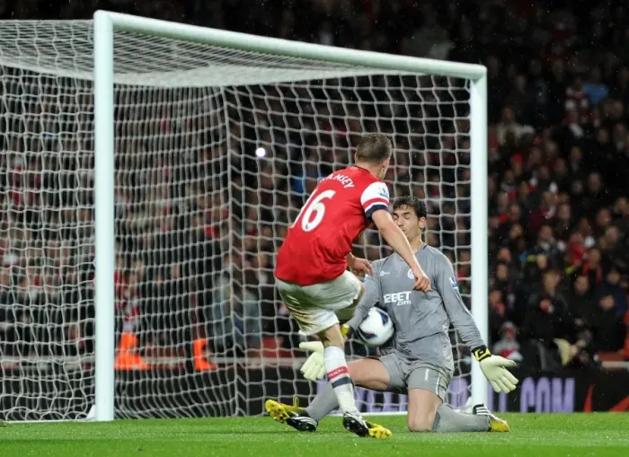 Framed Print : Arsenal's Aaron Ramsey Scores the Fourth Goal Against Wigan Athletic in the Premier League, Securing a 4:1 Victory at Emirates Stadium, May 14, 2013 Framed Print : Arsenal's Aaron Ramsey Scores the Fourth Goal Against Wigan Athletic in the Premier League, Securing a 4:1 Victory at Emirates Stadium, May 14, 2013