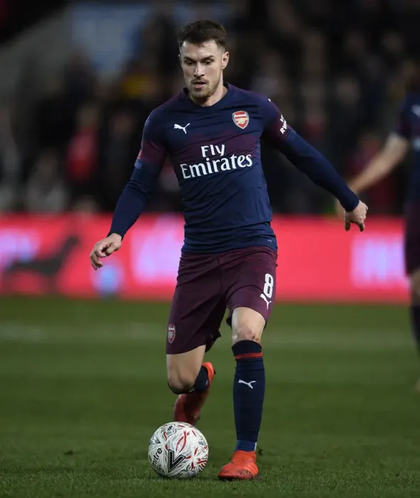 Framed Print : Arsenal's Aaron Ramsey Shines: Overpowering Blackpool in FA Cup Third Round Framed Print : Arsenal's Aaron Ramsey Shines: Overpowering Blackpool in FA Cup Third Round