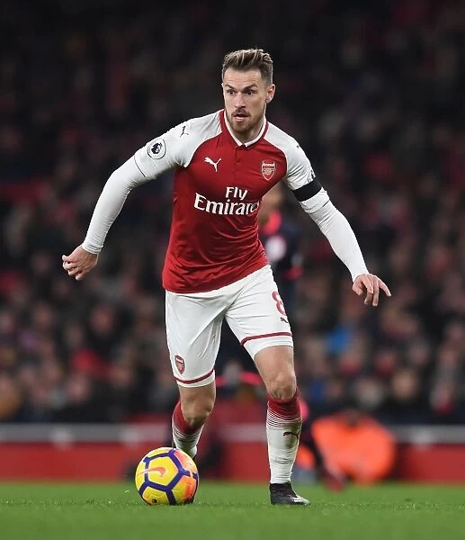Arsenal's Aaron Ramsey Shines in Premier League Clash Against Huddersfield Town
