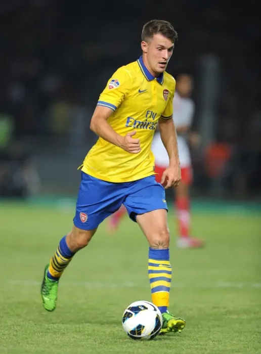 Framed Print : Arsenal's Aaron Ramsey Takes on Indonesia All-Stars in 2013 Showdown Framed Print : Arsenal's Aaron Ramsey Takes on Indonesia All-Stars in 2013 Showdown