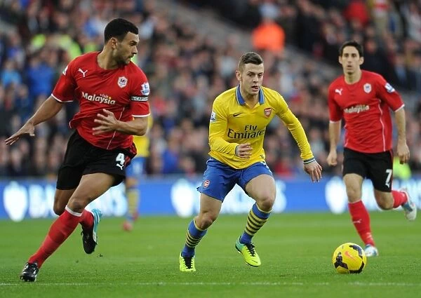 Arsenal's Aaron Ramsey Tangles with Steven Caulker in Premier League Clash (Cardiff City vs Arsenal, 2013)