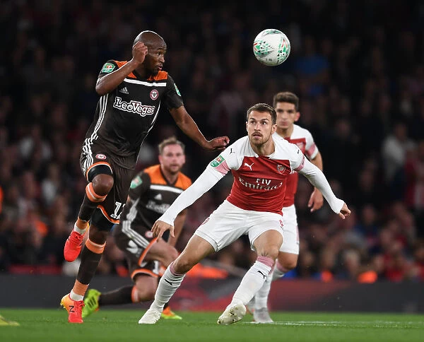 Arsenal's Aaron Ramsey vs. Brentford's Kamohelo Mokotjo: A Carabao Cup Showdown