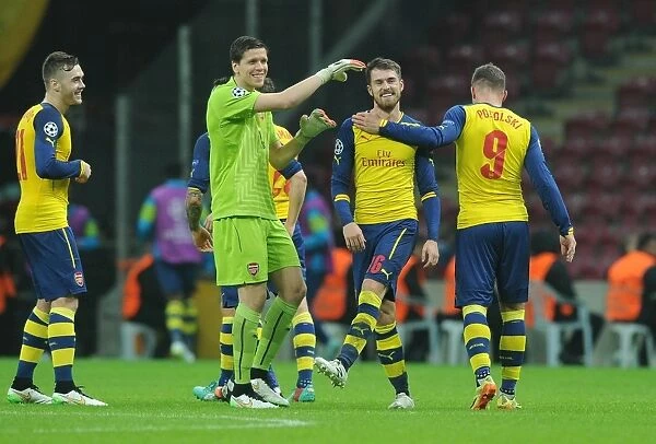 Arsenal's Aaron Ramsey, Wojciech Szczesny, and Lukas Podolski Celebrate Goal Against Galatasaray in UEFA Champions League