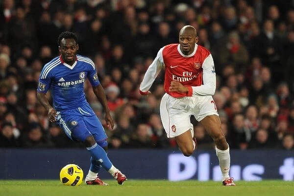 Arsenal's Abou Diaby and Chelsea's Michael Essien Clash in Intense Barclays Premier League Match: Arsenal 3:1 Chelsea, Emirates Stadium (December 27, 2010)