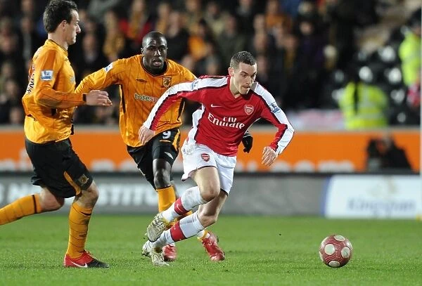 Arsenal's Abou Diaby and Jan Vennegoor of Hesselink Secure Victory Over Hull's Kamil Zayette: 2-1 Barclays Premier League Clash