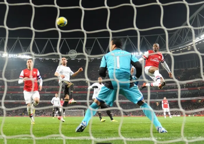 Framed Print : Arsenal's Abou Diaby Tries to Score Past Swansea's Michel Vorm in FA Cup Third Round Replay
