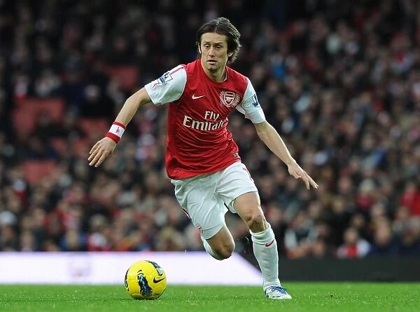 Arsenal's Agile Maestro: Rosicky in Action Against Wolverhampton Wanderers, 2011