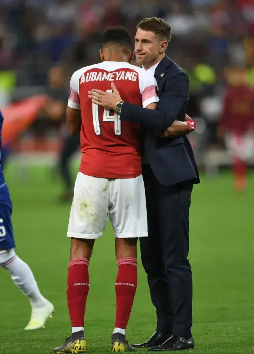 Framed Print : Arsenal's Agony: Aubameyang Consoled by Ramsey after Europa League Final Defeat vs Chelsea (Baku, 2019) Framed Print : Arsenal's Agony: Aubameyang Consoled by Ramsey after Europa League Final Defeat vs Chelsea (Baku, 2019)