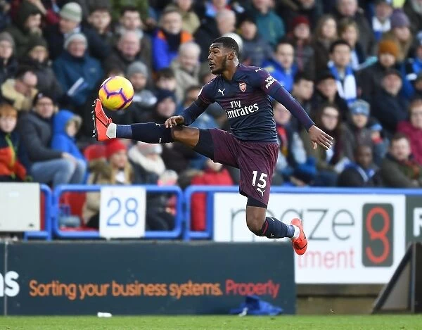Arsenal's Ainsley Maitland-Niles in Action against Huddersfield Town in Premier League
