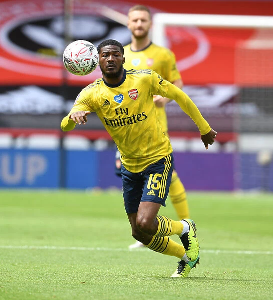 Arsenal's Ainsley Maitland-Niles in Action: FA Cup Quarterfinal Showdown vs Sheffield United