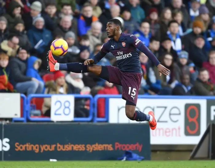 Framed Print : Arsenal's Ainsley Maitland-Niles in Action against Huddersfield Town in Premier League