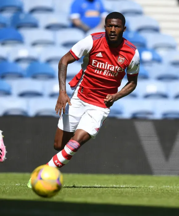 Framed Print : Arsenal's Ainsley Maitland-Niles in Action Against Rangers at Ibrox Stadium