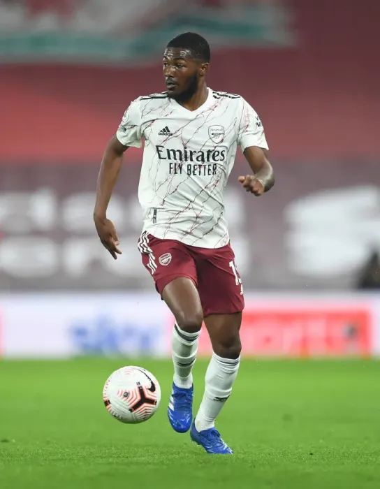Framed Print : Arsenal's Ainsley Maitland-Niles at Empty Anfield, 2020-21 Premier League Framed Print : Arsenal's Ainsley Maitland-Niles at Empty Anfield, 2020-21 Premier League