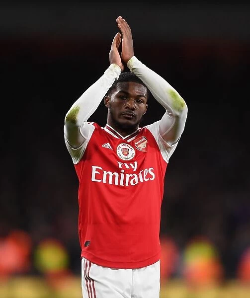 Arsenal's Ainsley Maitland-Niles Celebrates with Fans after Arsenal vs Manchester City, Premier League 2019-20